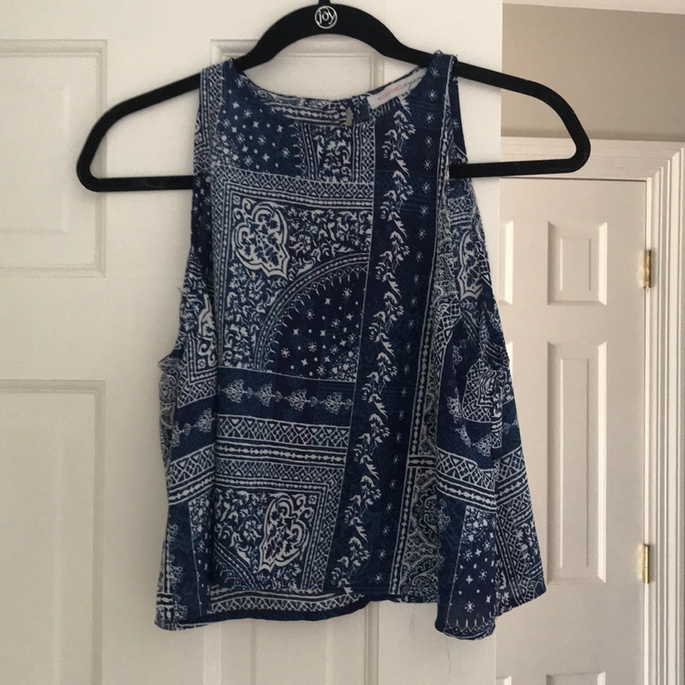 Women’s blue/ white blouse.